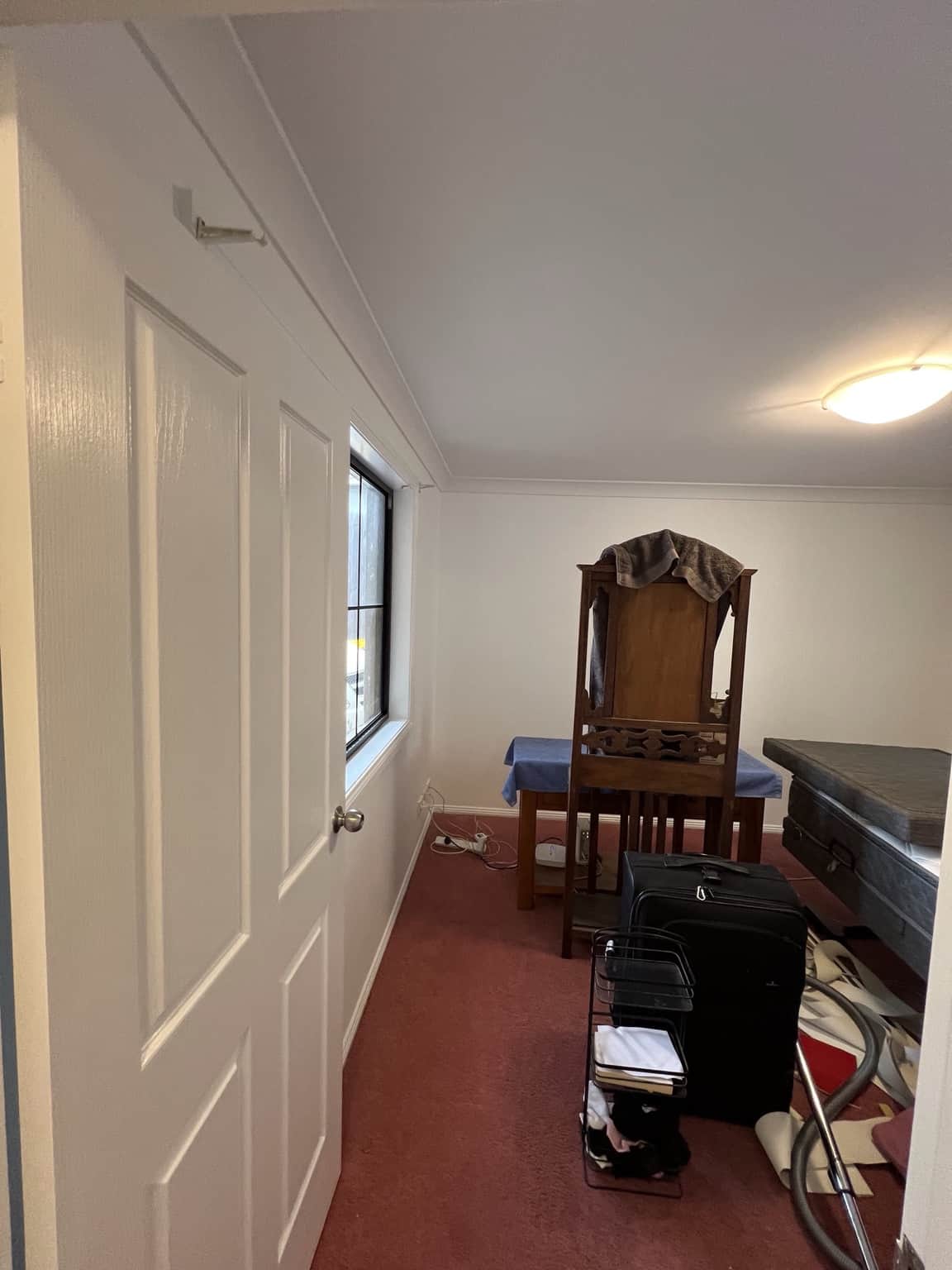 Bedroom after fresh wall, ceiling, door and trim painting in Merrylands
