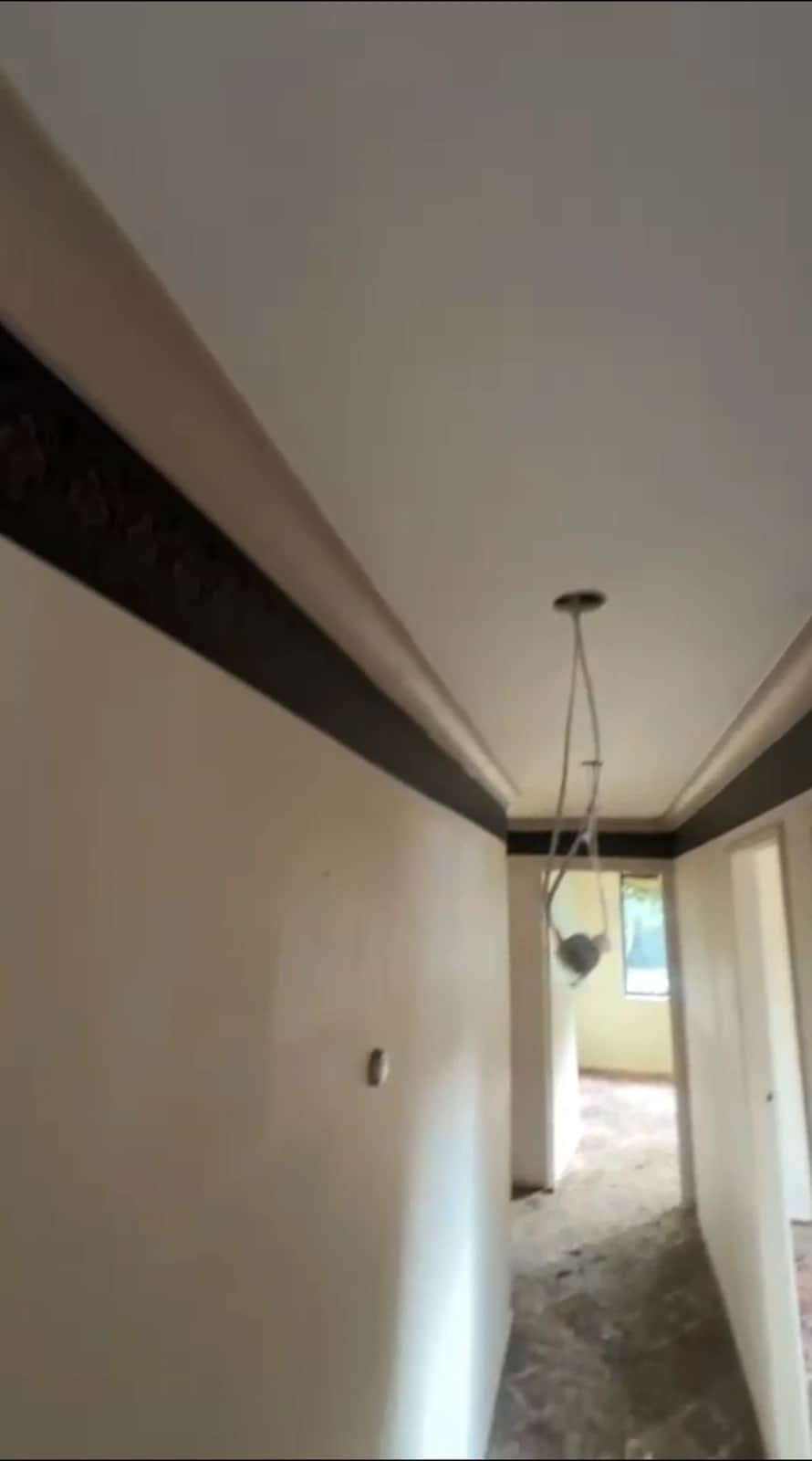 Hallway before full interior repainting in Baulkham Hills home