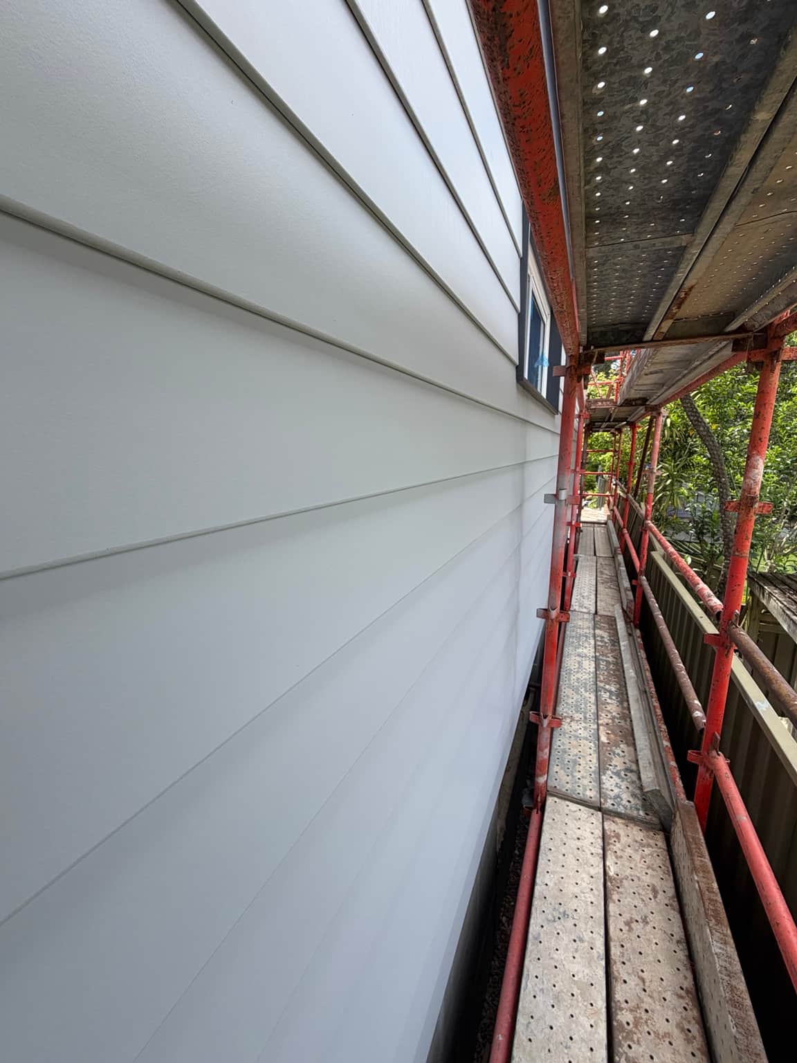 Close-up of horizontal cladding after exterior painting in Beecroft