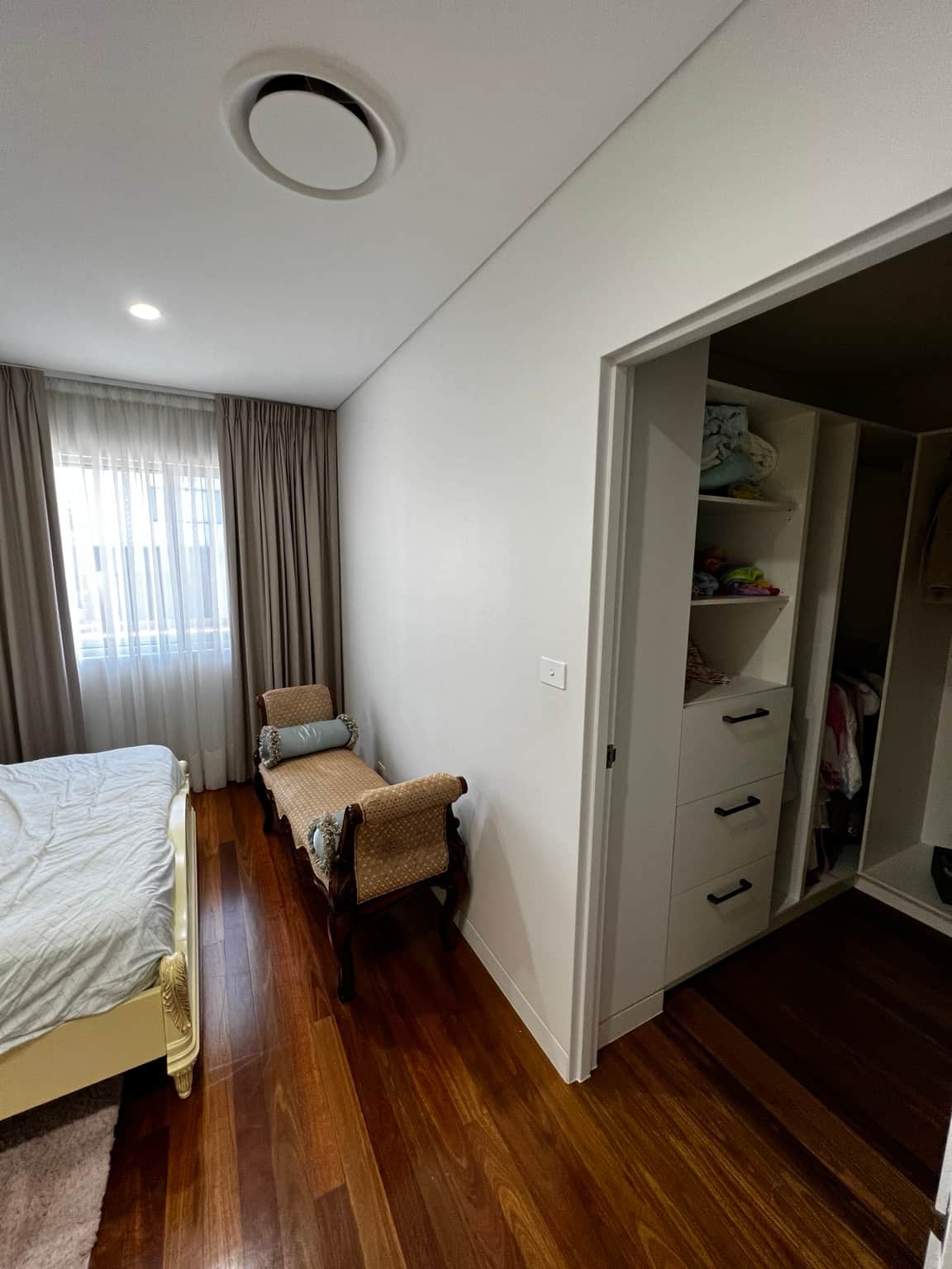 Bedroom ceiling and painted doorway leading to the ensuite