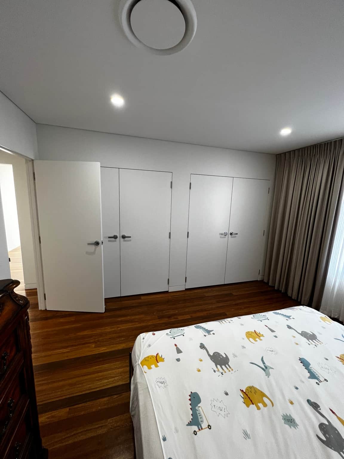 Bedroom ceiling and white wardrobe doors in a Bella Vista luxury home