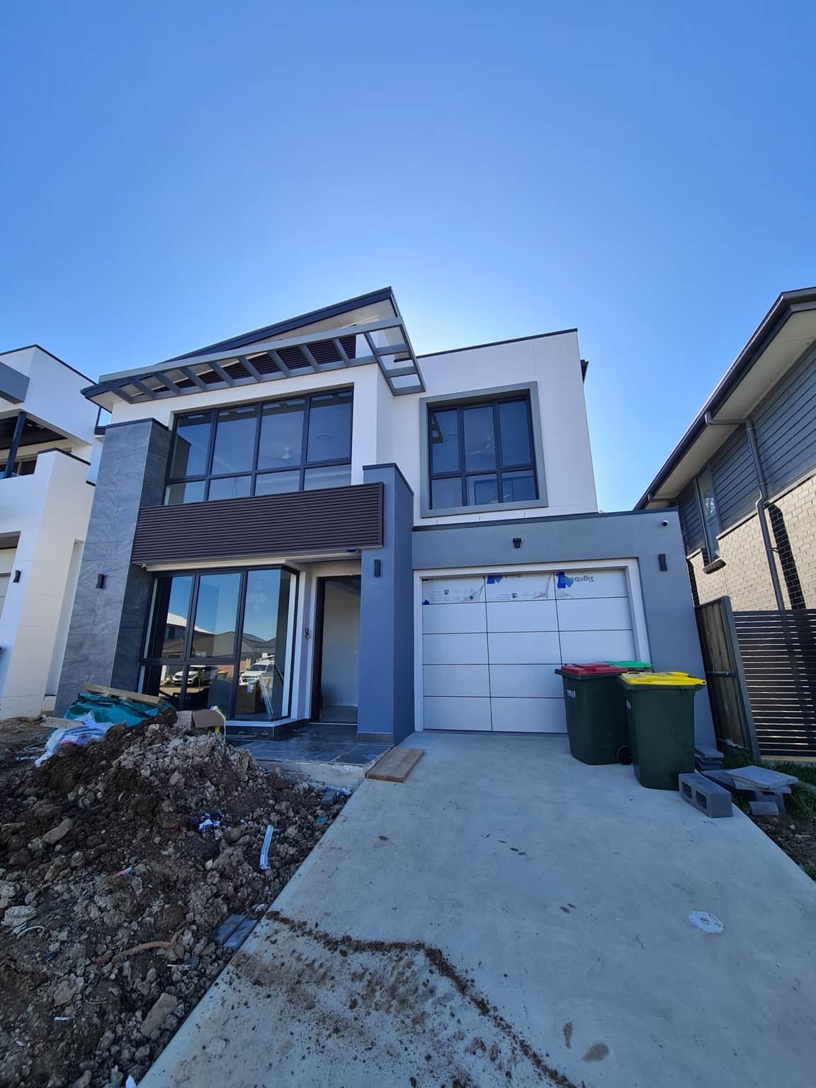 Front elevation of a new two-storey home in Box Hill with exterior painting using Taubmans All Weather