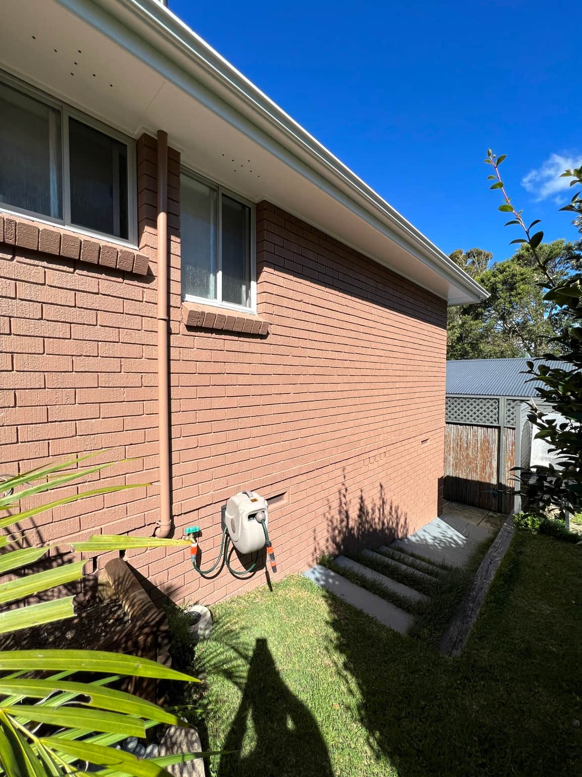 Painted brick wall beneath the rear windows in Cowan
