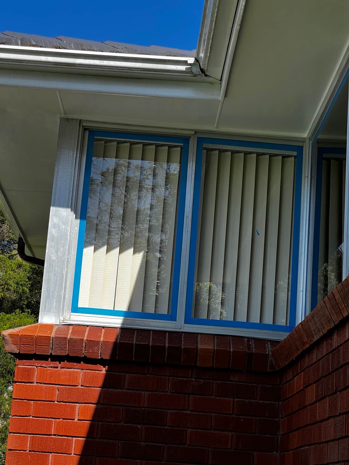Window masking and original brickwork during the Cowan project