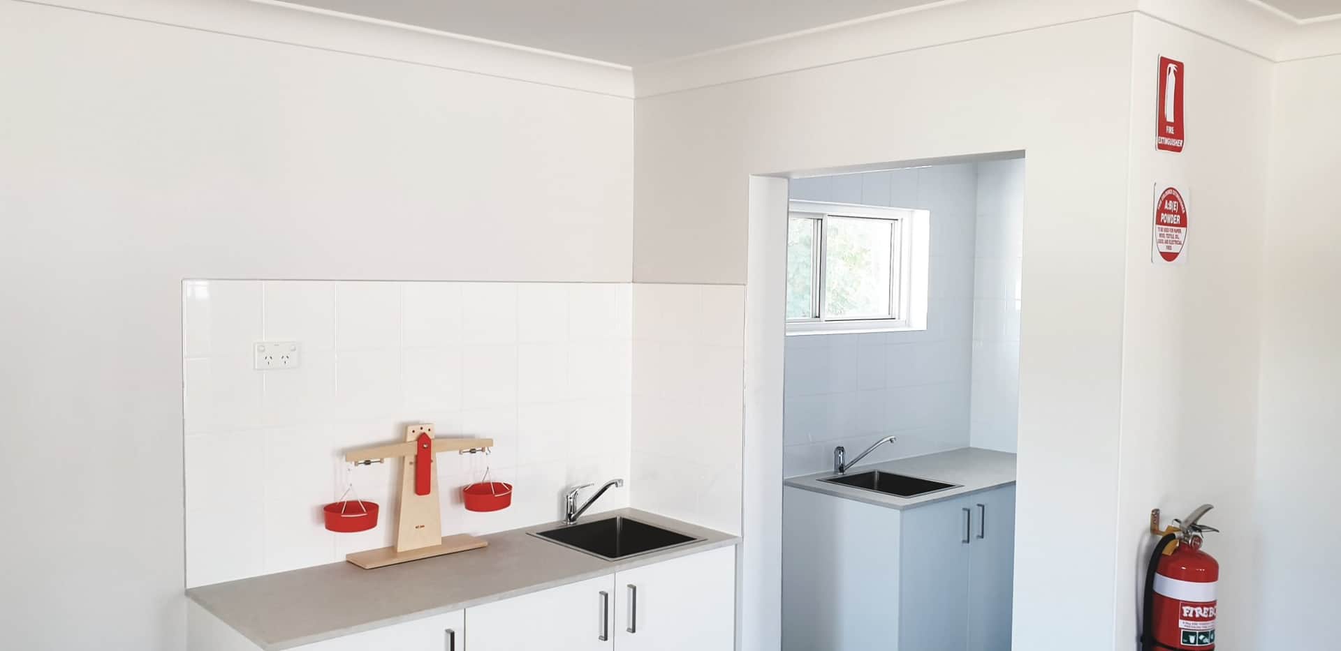 White painted walls above the sink areas at the Hornsby childcare centre