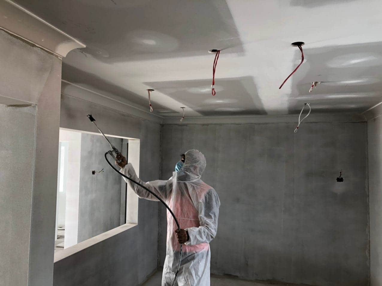 Spray painting in progress inside the new childcare centre in Hornsby