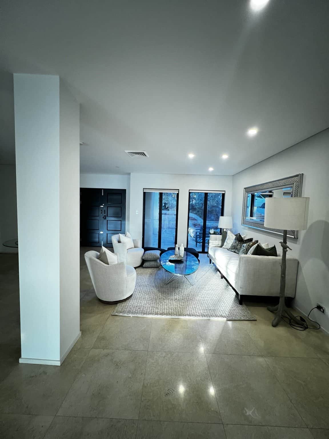 Painted ceiling and walls around a sitting area with glass doors in Northbridge.