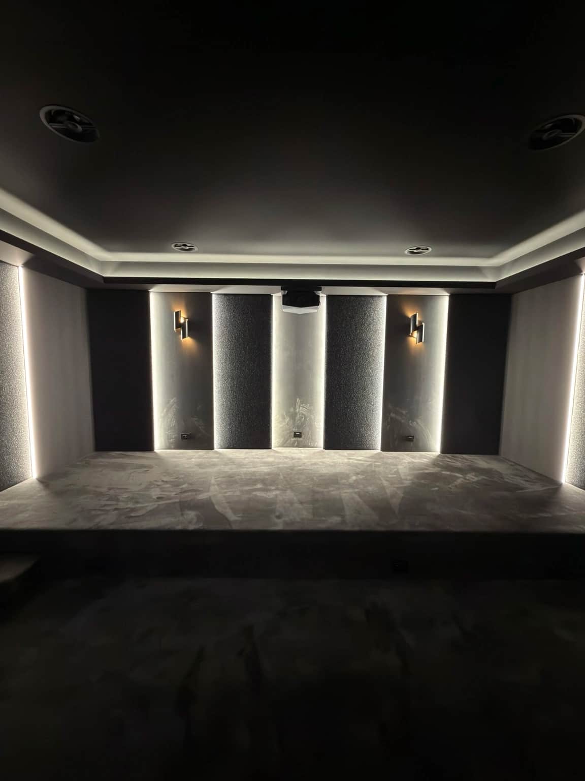 Oatlands home theatre with dark painted ceiling before seating was installed