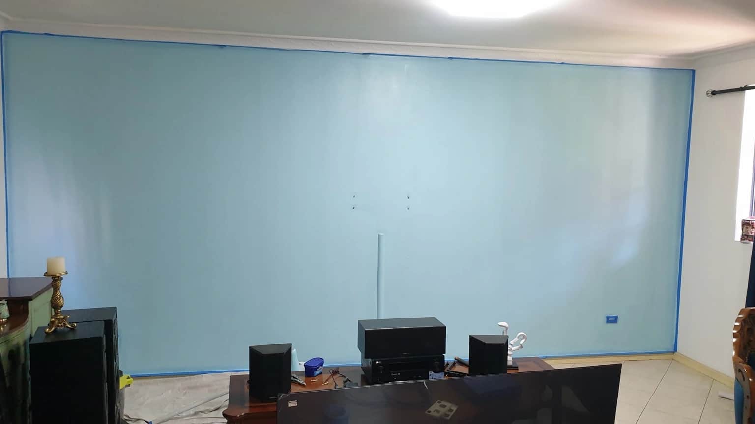 Pale blue basecoat on the Merrylands feature wall before the decorative finish