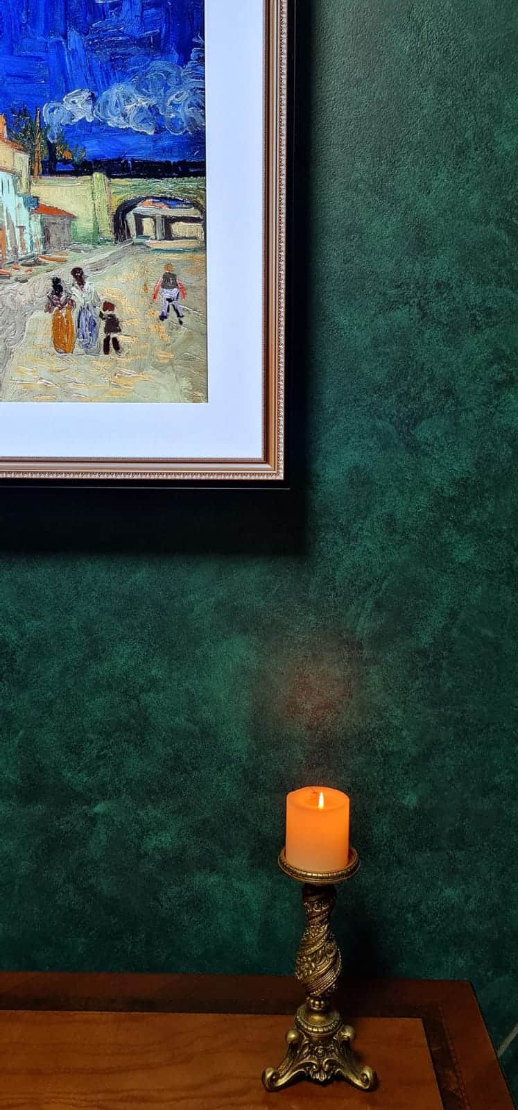 Detail of the hand-worked French Wash finish beside artwork in the Merrylands home