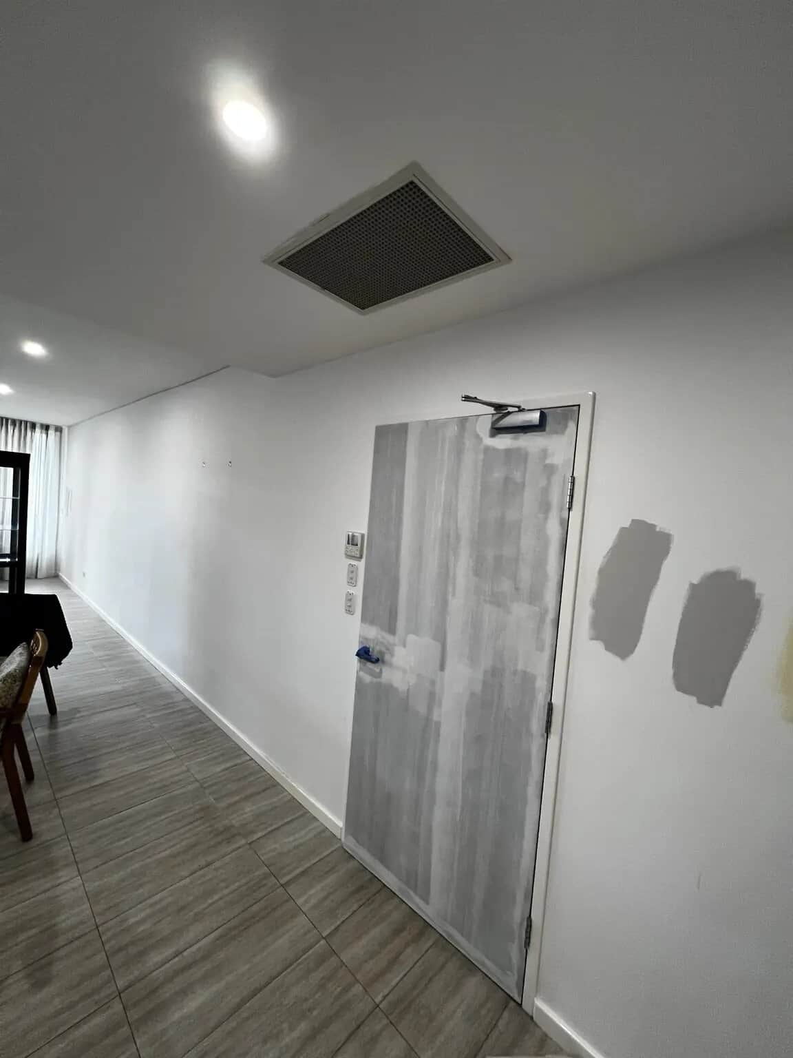 Internal door and hallway preparation before apartment painting in Rouse Hill