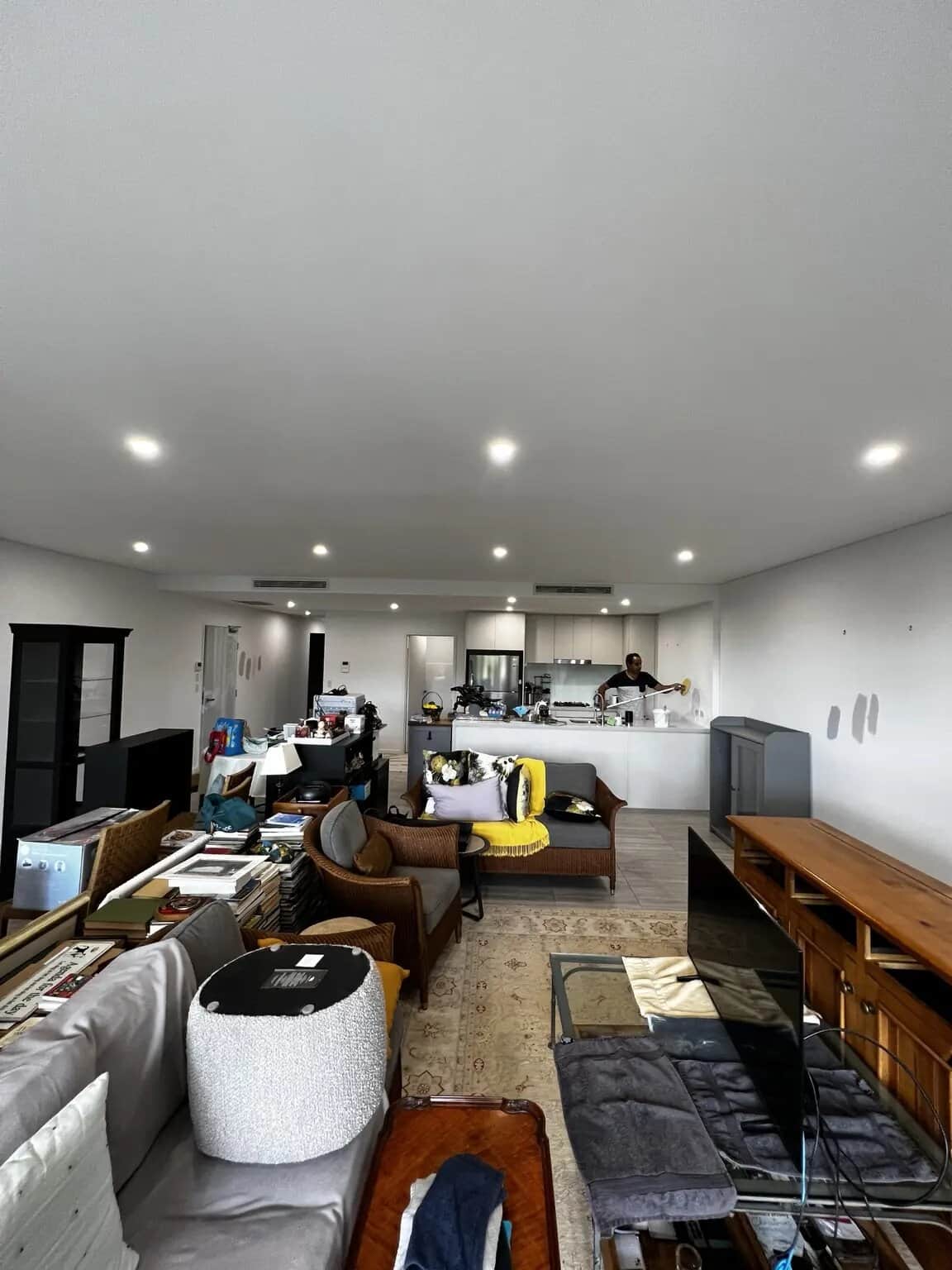 Open-plan living area before interior apartment repainting in Rouse Hill