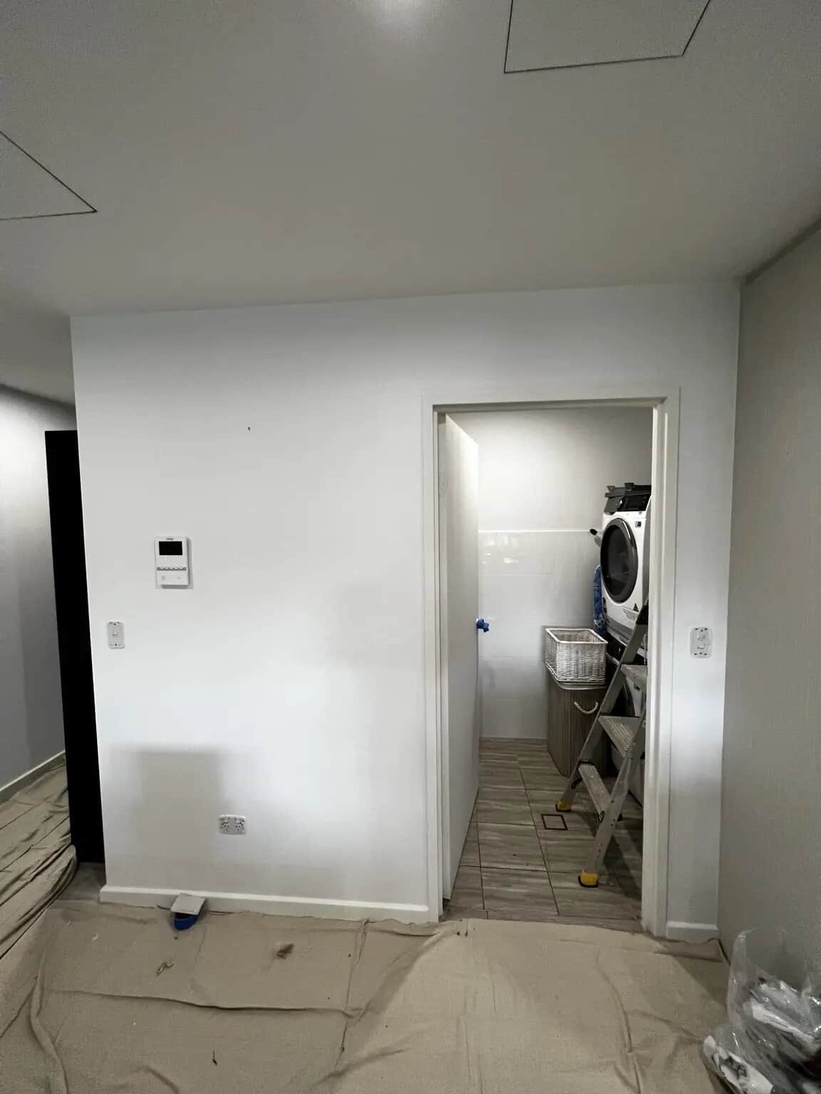 Laundry entrance wall preparation before interior painting in Rouse Hill