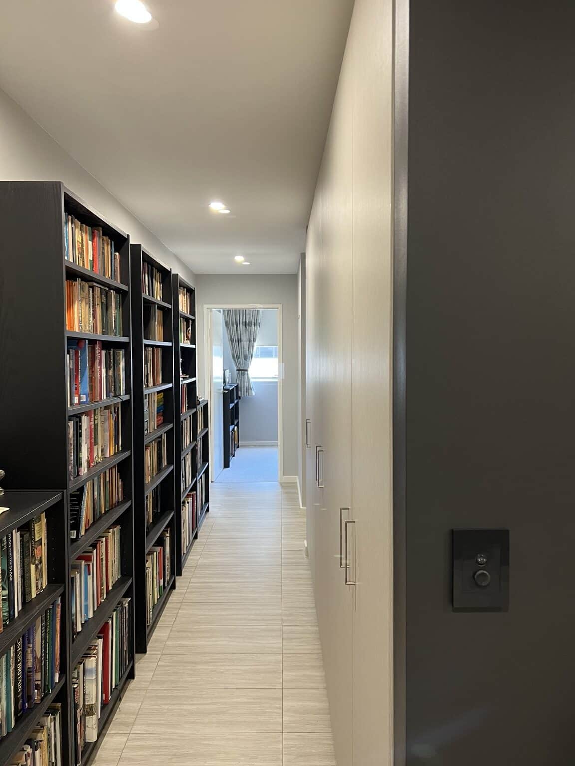 Finished apartment hallway with professionally painted walls and woodwork in Rouse Hill
