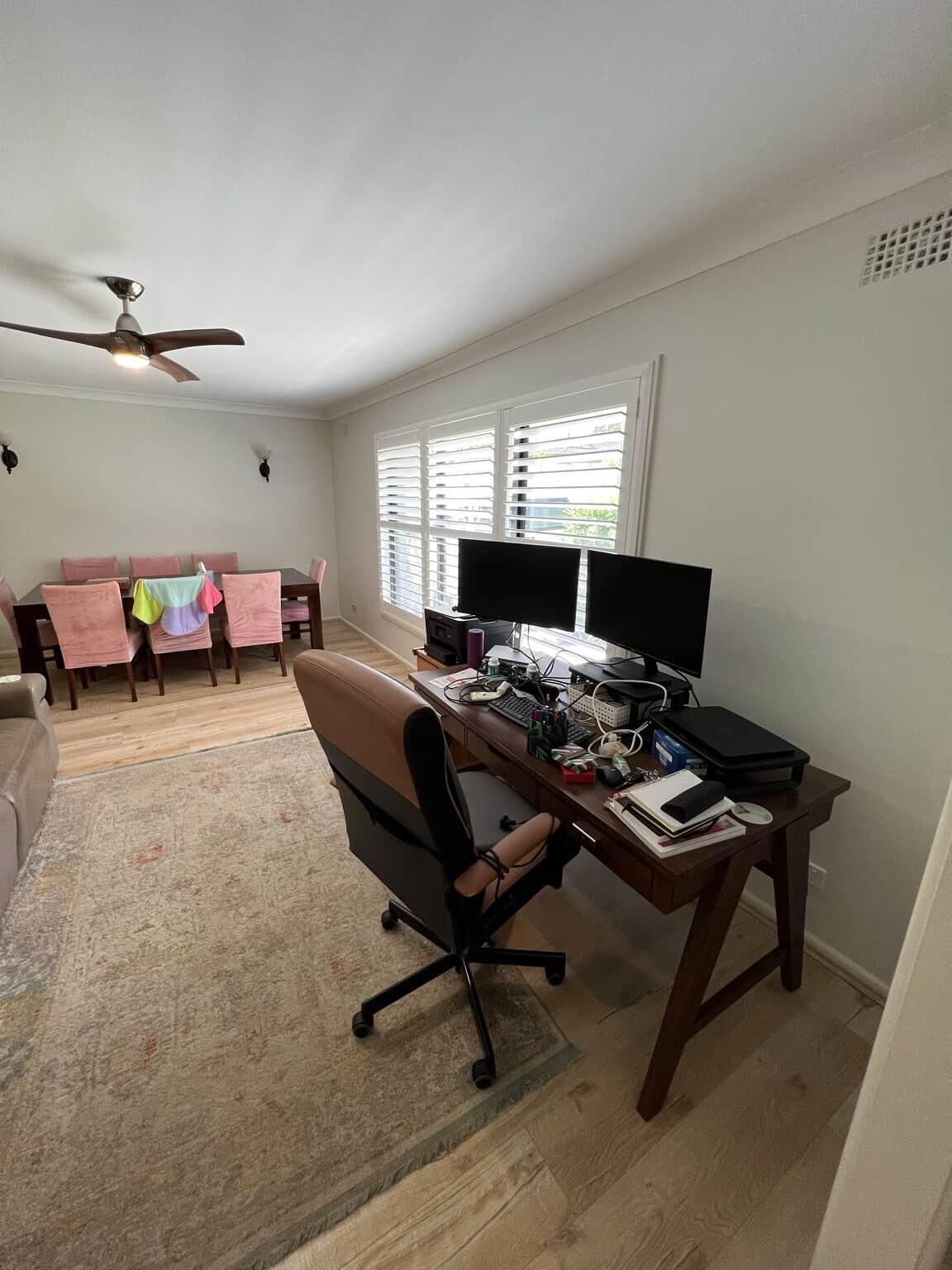 Painted home office and dining area in Winston Hills with clean neutral walls and bright white trim.