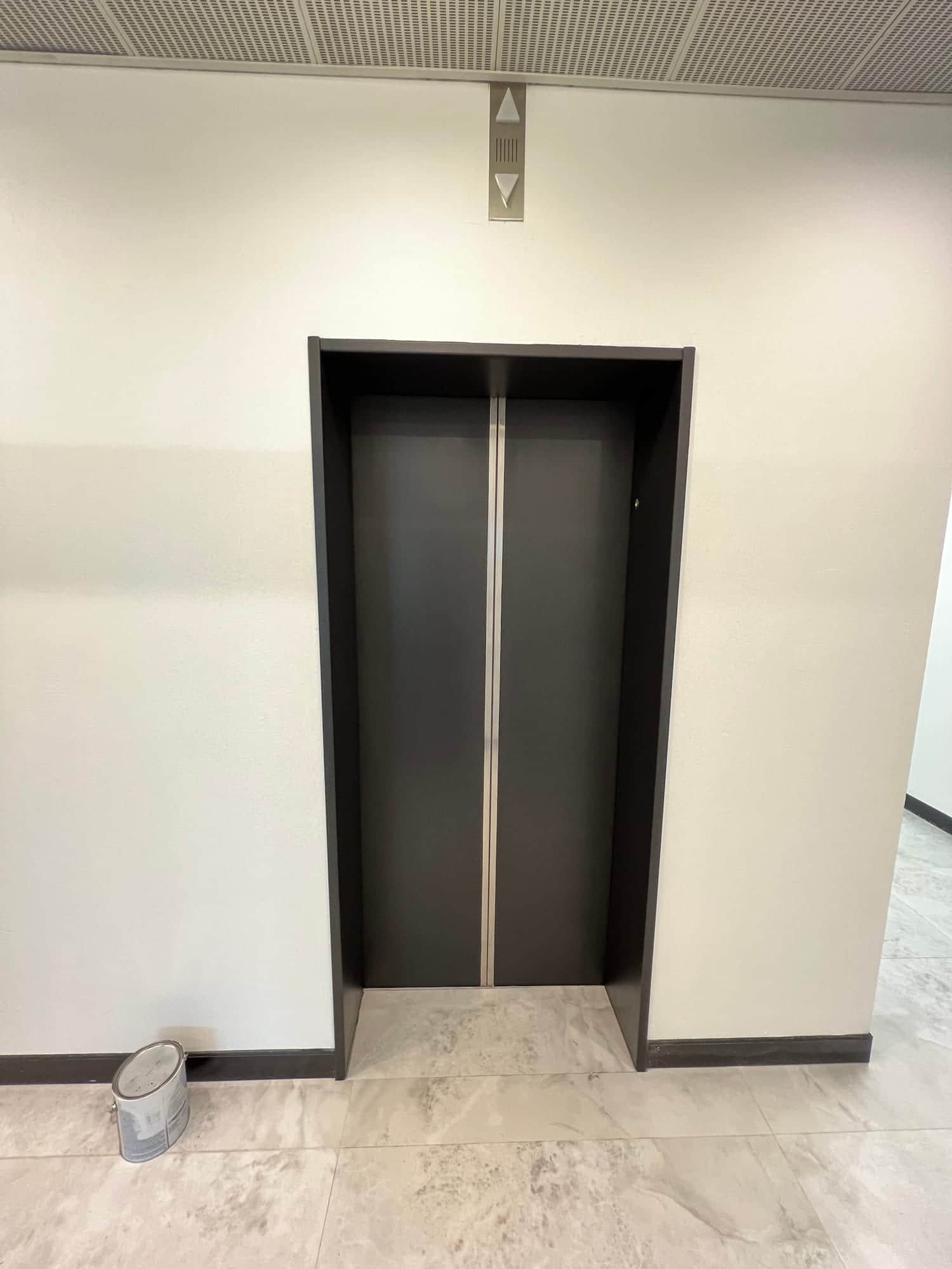 Commercial lift door painting in Chatswood, Sydney